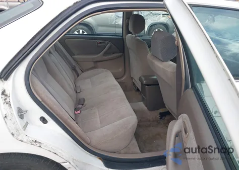 2000 Toyota Camry Le from USA, damaged, VIN JT2BG22K6Y0438590